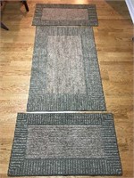 Set of 3 small area rugs.