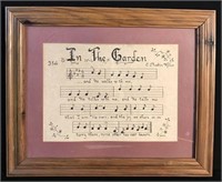 Framed hand lettered "In The Garden" hymnal