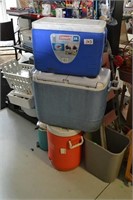 assorted coolers and step ladder