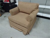 Upholstered chair with cushions
