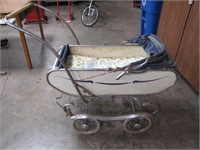 Vintage 4 wheeled baby buggy w/ springs,