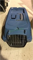 Small cat size blue travel cage with spring lock