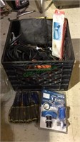 Milk crate filled with items, tools, 2 extension
