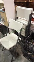 Three hard plastic folding chairs, aluminum base,