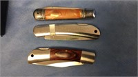 3 pocket knives, one marked NRA, one with a