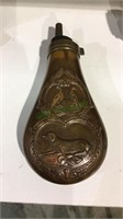 Molded copper powder flask with hunting dog &