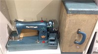 Petite precision sewing machine with foot