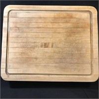 Very nice wood cutting board.