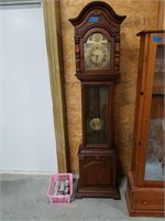 Tempus fugit grandfather clock.