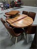 Oval dining table with 6 chair, extra leaf