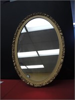 GUILDED WOOD FRAMED OVAL MIRROR