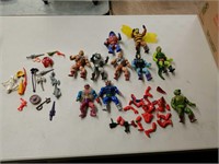 11 Assorted He-Man MOTU action figures & some