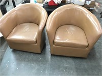 Two leather swivel chair-one ripped