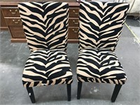 Zebra pattern chairs. Good condition-preowned.