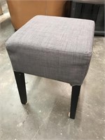Grey footstool