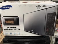 Samsung microwave oven MG14H3020CM new. Open box