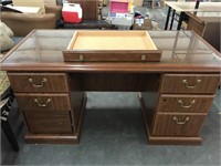 Glass top executive desk. Middle drawer needs