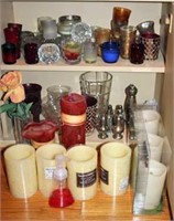 Assortment of Candles and Candle Holders