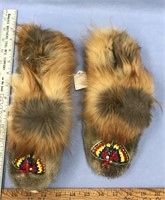 Pair of slippers, about 9.5" long, have been used