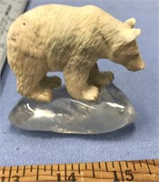 3" Antler carved grizzly bear, imported, on quartz