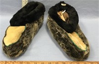 Pair of sealskin slipper by Danni Woods Caldville