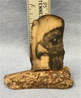 Fossilized ivory scrimshawed eagle  3" tall by Mic