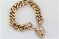 Hallmarked 9ct gold bracelet with heart lock