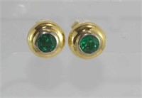 Good 18ct two tone gold and emerald studs