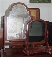 Two vintage toilet mirrors