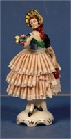 Vintage Dresden woman with flowers figure