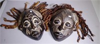 Two vintage tribal art wall masks