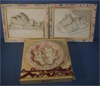 Three decorative plaques