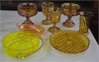 Seven carnival glass bowls, vase, etc