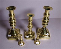 Five various vintage brass candlesticks