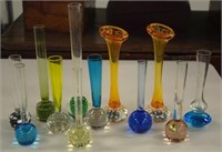 Twelve coloured glass specimen vases