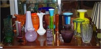 Twenty two coloured glass vases