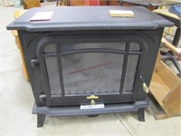Free standing electric heater: makes flame,