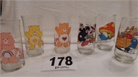 6 COLLECTIBLE GLASSES CARE BEARS AND SMURFS