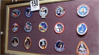 15 ASSORTED PATCHES ON FRAMED WOODEN BOARD 24X44