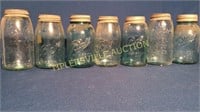 Lot of 7 blue quart jars with zinc lids- mason
