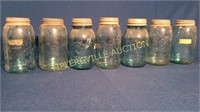 Lot of 7 blue quart jars with zinc lids- All Ball