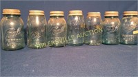 Lot of 7 blue quart jars with zinc lids- ball a