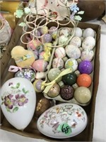 collection of easter egss an stand
