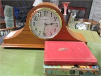 Herman Miller mantle clock and books