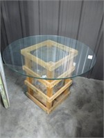 Bottle in crate table with glass top