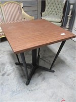Mid century table with cast legs