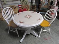 Round tile top table two chairs