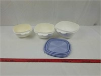 3 nesting Tupperware bowls with purple lids