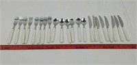 Stainless flatware with white plastic handles