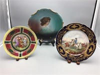Lot of three hand-painted decorative plates